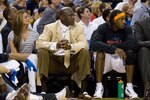 CHARLOTTE, NC - APRIL 26: Charlotte Bobcats owner Michael Jordan (left) and Gerald Wallce #3 watch the play against the Orlando Magic at Time Warner Cable Arena on April 26, 2010 in Charlotte, North Carolina.  The Magic defeated the Bobcats 99-90 to complete the four game sweep.  NOTE TO USER: User expressly acknowledges and agrees that, by downloading and or using this Photograph, user is consenting to the terms and conditions of the Getty Images License Agreement.   (Photo by Brian A. Westerholt/Getty Images)
