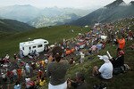 PAU, FRANCE - JULY 20: Thousands cheer on the peloton as they come to the top of the Col du Tourmalet during stage 16 of the Tour de France on July 20, 2010 in Pau, France. The stage, between Bagneres-de-Luchon and Pau, featured four major climbs including the Col du Tourmalet. French rider Pierrick Fedrigo won the stage while Alberto Contador retained the yellow jersey. The iconic bicycle race will include a total of 20 stages and will cover 3,642km before concluding in Paris on July 25.  (Photo by Spencer Platt/Getty Images)
