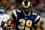 ST. LOUIS - NOVEMBER 29:  Steven Jackson #39 of the St. Louis Rams runs with the ball for yardage against the Seattle Seahawks during their NFL game at Edward Jones Dome on November 29, 2009 in St. Louis, Missouri. The Seahawks defeated the Rams 27-17.  (Photo by Dilip Vishwanat/Getty Images)