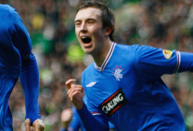 GLASGOW, SCOTLAND - JANUARY 03:  Lee McCulloch (L) of Rangers celebrates with Danny Wilson after scoring during the Scottish Premier League match between Celtic and Rangers at Celtic Park on January 3, 2010 in Glasgow, Scotland.  (Photo by Jeff J Mitchell/Getty Images)