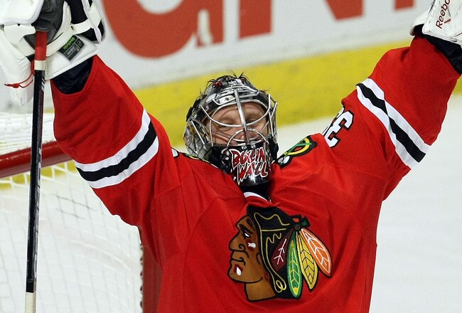 CHICAGO - MAY 11:  Goalie Nikolai Khabibulin #39 of the Chicago Blackhawks celebrates after the Blackhawks won 7-5 against the Vancouver Canucks during Game Six of the Western Conference Semifinal Round of the 2009 Stanley Cup Playoffs on May 11, 2009 at the United Center in Chicago, Illinois.  (Photo by Jonathan Daniel/Getty Images)