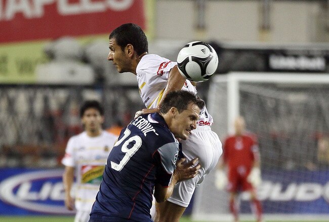 FOXBORO, MA - JULY 20:  Jaime Lozano #21 of Monarcas Morelia and Marko Perovic #29 of the New England Revolution battle for the ball during the SuperLiga 2010 on July 20, 2010 at Gillette Stadium in Foxboro, Massachusetts.  (Photo by Elsa/Getty Images)