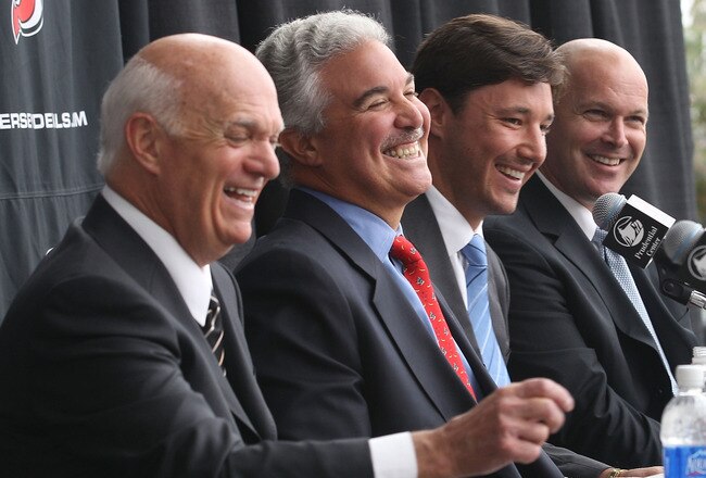 NEWARK, NJ - JULY 20: General Manager Lou Lamoriello, owner Jeff Vanderbeek, Ilya Kovalchuk, and head coach John Maclean of the New Jersey Devils speak with the media during a press conference announcing his contract renewal at the Prudential Center on July 20, 2010 in Newark, New Jersey.  (Photo by Bruce Bennett/Getty Images)