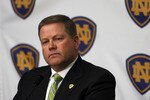 SOUTH BEND, IN - DECEMBER 11: Brian Kelly attends a press conference where he was named new football head coach at Notre Dame University on December 11, 2009 in South Bend, Indiana.  Kelly most recently led the University of Cincinnati to two consecutive Bowl Championship Series appearances including a perfect 12-0 record this past season. (Photo by Frank Polich/Getty Images)