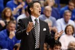 LEXINGTON, KY - JANUARY 02:  Rick Pitino the Head Coach of the Louisville Cardinals gives instructions to his team during the game against the Kentucky Wildcats at Rupp Arena on January 2, 2010 in Lexington, Kentucky. Kentucky won 71-62.  (Photo by Andy Lyons/Getty Images)