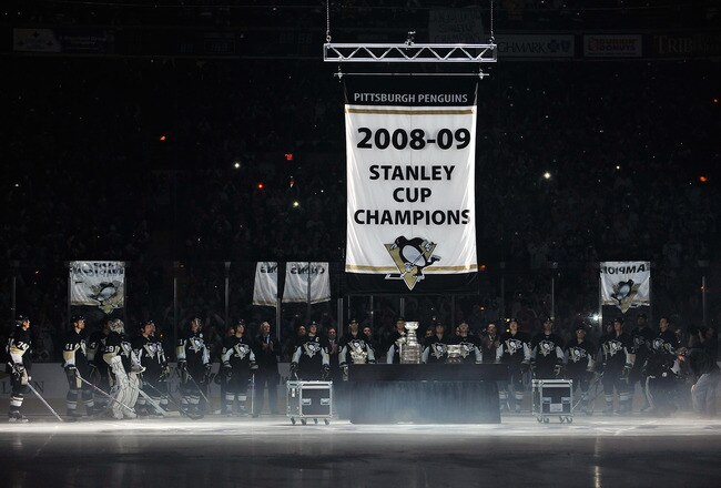 PITTSBURGH - OCTOBER 2: The Pittsburgh Penguins raise their Stanley Cup Champions banner in a ceremony before a game against the New York Rangers on October 2, 2009 at Mellon Arena in Pittsburgh, Pennsylvania. Pittsburgh defeated New York 3-2.  (Photo by Jamie Sabau/Getty Images)