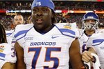 GLENDALE, AZ - JANUARY 04:  Faraji Wright #75 of the Boise State Broncos looks on after defeating the TCU Horned Frogs during the Tostitos Fiesta Bowl at the Universtity of Phoenix Stadium on January 4, 2010 in Glendale, Arizona.  (Photo by Christian Petersen/Getty Images)