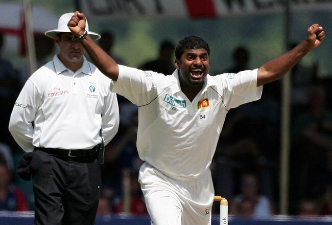 KANDY, SRI LANKA - DECEMBER 03:  Sri Lankan bowler Muttiah Muralitharan celebrates after taking his World Record 709th Test wicket, that of England batsman Paul Collingwood, during the third day of the First Test match between Sri Lanka and England at Asgiriya Stadium on December 3, 2007 in Kandy, Sri Lanka.  (Photo by Stu Forster/Getty Images)