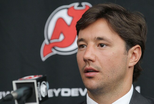 NEWARK, NJ - JULY 20:  Ilya Kovalchuk of the New Jersey Devils speaks with the media after announcing his contract renewal at the Prudential Center on July 20, 2010 in Newark, New Jersey.  (Photo by Bruce Bennett/Getty Images)