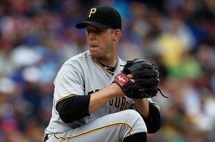 CHICAGO - MAY 15: Starting pitcher Paul Maholm #28 of the Pittsburgh Pirates delivers the ball against the Chicago Cubs at Wrigley Field on May 15, 2010 in Chicago, Illinois. (Photo by Jonathan Daniel/Getty Images)