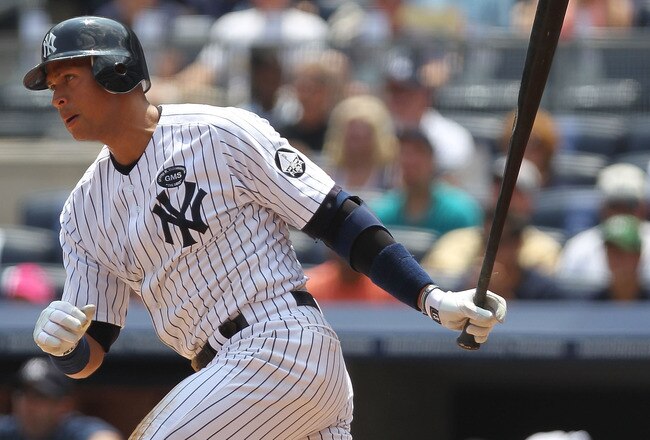 NEW YORK - JULY 21: Alex Rodriguez #13 of the New York Yankees grounds out and scores Derek Jeter #2 of the New York Yankees during a game against the Los Angeles Angels of Anaheim at Yankee Stadium on July 21, 2010 in the Bronx borough of New York City.  (Photo by Nick Laham/Getty Images)