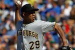 CHICAGO - JUNE 30: Octavio Dotel #29 of the Pittsburgh Pirates pitches in the 9th inning on his way to a save against the Chicago Cubs at Wrigley Field on June 30, 2010 in Chicago, Illinois. The Pirates defeated the Cubs 2-0. (Photo by Jonathan Daniel/Getty Images)