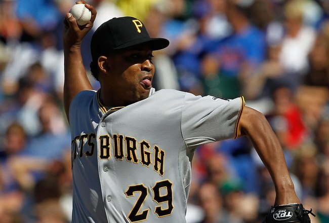 CHICAGO - JUNE 30: Octavio Dotel #29 of the Pittsburgh Pirates pitches in the 9th inning on his way to a save against the Chicago Cubs at Wrigley Field on June 30, 2010 in Chicago, Illinois. The Pirates defeated the Cubs 2-0. (Photo by Jonathan Daniel/Getty Images)