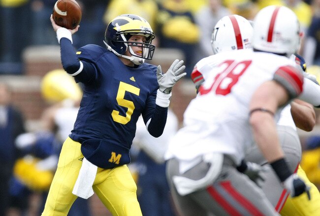 ANN ARBOR, MI - NOVEMBER 21: Tate Forcier #5 of the Michigan Wolverines throws a first quarter pass while playing the Ohio State Buckeyes on November 21, 2009 at Michigan Stadium in Ann Arbor, Michigan.  (Photo by Gregory Shamus/Getty Images)