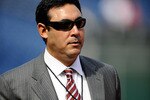 PHILADELPHIA - OCTOBER 08:  General Manager Ruben Amaro Jr. of the Philadelphia Phillies stands on the field during batting practice prior to Game Two of the NLDS against the Colorado Rockies during the 2009 MLB Playoffs at Citizens Bank Park on October 8, 2009 in Philadelphia, Pennsylvania.  (Photo by Jeff Zelevansky/Getty Images)