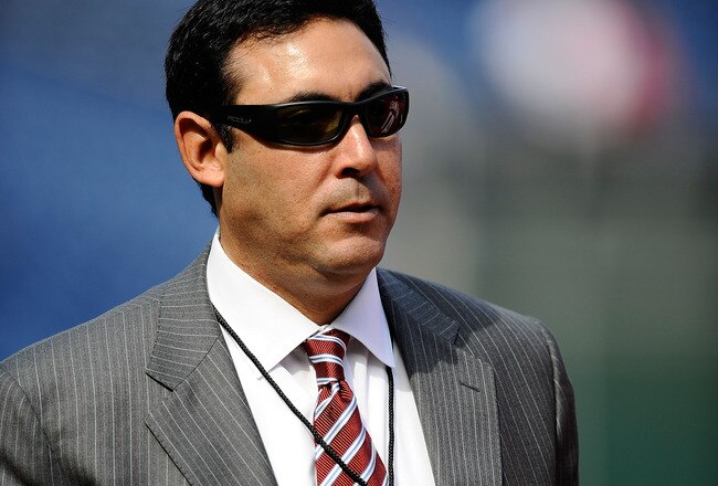 PHILADELPHIA - OCTOBER 08:  General Manager Ruben Amaro Jr. of the Philadelphia Phillies stands on the field during batting practice prior to Game Two of the NLDS against the Colorado Rockies during the 2009 MLB Playoffs at Citizens Bank Park on October 8, 2009 in Philadelphia, Pennsylvania.  (Photo by Jeff Zelevansky/Getty Images)