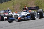 LEEDS, AL - APRIL 9:   E.J. Viso of Venezuela, driver of the #8 KV Racing Technology Dallara Honda leads Milka Duno, driver of the #18  CITGO Dallara Honda through turn one during practice for the IRL IndyCar Series Grand Prix of Alabama at the Barber Motorsports Park on April 9, 2010 in Leeds, Alabama. (Photo by Dave Martin/Getty Images)