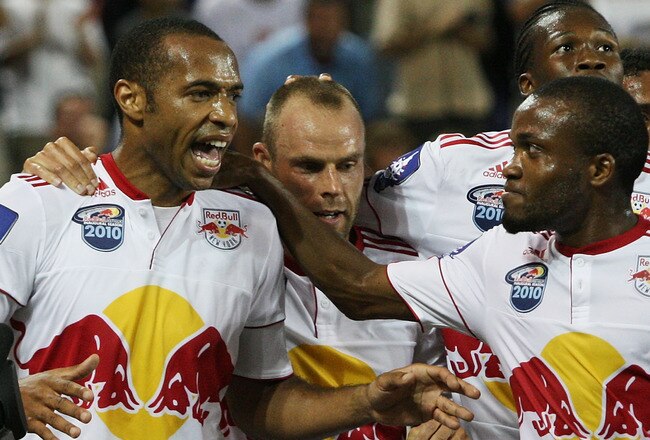 HARRISON, NJ - JULY 22:  Thierry Henry #14 of the New York Red Bulls celebrates his goal in the 25th minute with teammates Dane Richards #19 and Joel Lindpere #20 against the Tottenham Hotspur on July 22, 2010 at Red Bull Arena in Harrison, New Jersey. (Photo by Mike Stobe/Getty Images for New York Red Bull)  (Photo by Mike Stobe/Getty Images for New York Red Bulls)