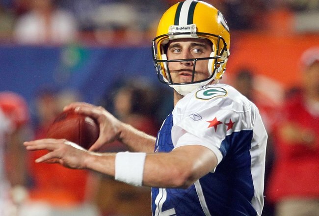 MIAMI GARDENS, FL - JANUARY 31:  Aaron Rodgers #12 of the NFC's Green Bay Packers makes a pass play during the 2010 AFC-NFC Pro Bowl game at Sun Life Stadium on January 31, 2010 in Miami Gardens, Florida. The AFC defeated the NFC 41-34. (Photo by Scott Halleran/Getty Images)