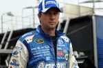 LOUDON, NH - JUNE 26: David Reutimann, driver of the #00 Aaron's Dream Machine Toyota, walks to the garage during practice for the NASCAR Sprint Cup Series LENOX Industrial Tools 301 at New Hampshire Motor Speedway on June 26, 2010 in Loudon, New Hampshire.  (Photo by Drew Hallowell/Getty Images for NASCAR)