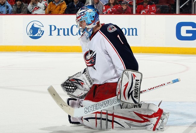 NEWARK, NJ - MARCH 23:  Steve Mason #1 of the Columbus Blue Jackets defends against the New Jersey Devils at the Prudential Center on March 23, 2010 in Newark, New Jersey. The Devils defeated the Blue Jackets 6-3.  (Photo by Jim McIsaac/Getty Images)