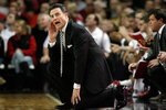LOUISVILLE, KY - DECEMBER 30:  Rick Pitino the Head coach of the Louisville Cardinals gives instructions to his team during the Big East Conference game against the South Florida Bulls  on December 30, 2009 in Louisville, Kentucky.  (Photo by Andy Lyons/Getty Images)