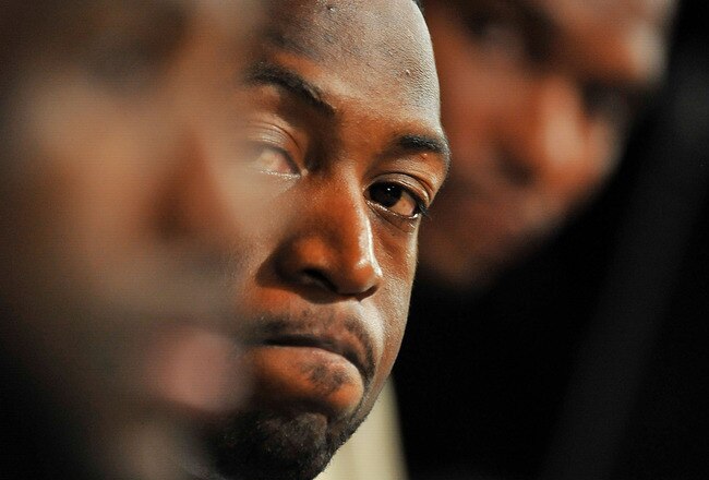 MIAMI - JULY 09:  Dwyane Wade #3 (C)  of the Miami Heat listens to teammate LeBron James  during a press conference after a welcome party at American Airlines Arena on July 9, 2010 in Miami, Florida.  (Photo by Doug Benc/Getty Images)
