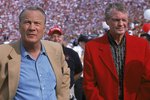 28 Oct 2000:  (L-R) Former Head Coach Barry Switzer of the Oklahoma Sooners stands with the Former Head Coach Tom Osborne of the Nebraska Cornhuskers during the game at the Oklahoma Memorial Stadium in Norman, Oklahoma. The Sooners defeated the Cornhuskers 31-14.Mandatory Credit: Brian Bahr  /Allsport
