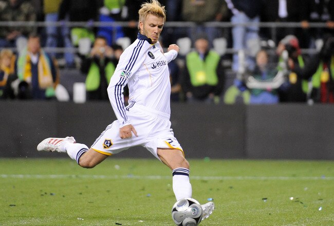 SEATTLE - NOVEMBER 22:  David Beckham #23 of the Los Angeles Galaxy takes a penalty kick against Real Salt Lake in the shootout following regulation time in the MLS Cup final at Qwest Field on November 22, 2009 in Seattle, Washington.  (Photo by Harry How/Getty Images)