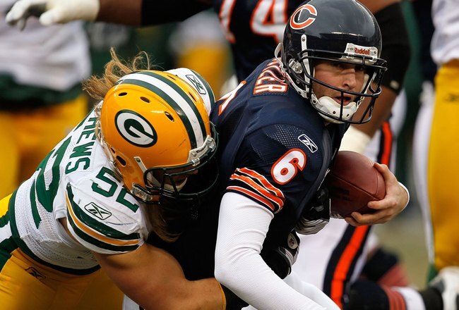 CHICAGO - DECEMBER 13: Clay Matthews #52 of the Green Bay Packers sacks Jay Cutler #6 of the Chicago Bears at Soldier Field on December 13, 2009 in Chicago, Illinois. The Packers defeated the Bears 21-14. (Photo by Jonathan Daniel/Getty Images)