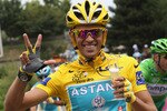 PARIS - JULY 25:  Alberto Contador of team Astana celebrates his third Tour win during the twentieth and final stage of Le Tour de France 2010, from Longjumeau to the Champs-Elysees in Paris on July 25, 2010 in Paris, France.  (Photo by Bryn Lennon/Getty Images)