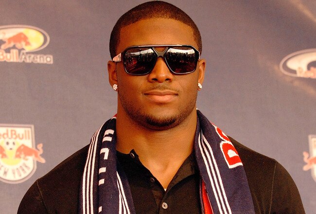 HARRISON, NJ - MARCH 20:  2010 Super Bowl champion Reggie Bush #25 of the New Orleans Saints poses for a photo prior to a match between the New York Red Bulls and Santos FC at the first match to be played at Red Bull Arena on March 20, 2010 in Harrison, New Jersey.  (Photo by Jonathan Fickies/Getty Images for New York Red Bulls)