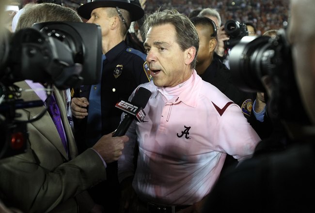 PASADENA, CA - JANUARY 07:  Head coach Nick Saban of the Alabama Crimson Tide talks to reporters on the field after winning the Citi BCS National Championship game over the Texas Longhorns at the Rose Bowl on January 7, 2010 in Pasadena, California. The Crimson Tide defeated the Longhorns 37-21.  (Photo by Stephen Dunn/Getty Images)