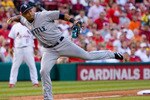 ST. LOUIS - JUNE 14: Jose Lopez #4 of the Seattle Mariners throws to first base against the St. Louis Cardinals at Busch Stadium on June 14, 2010 in St. Louis, Missouri.  The Cardinals beat the Mariners 9-3.  (Photo by Dilip Vishwanat/Getty Images)