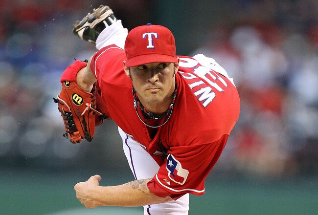 ARLINGTON, TX - JULY 23:  C.J. Wilson #36 of the Texas Rangers throws against the Los Angeles Angels of Anaheim on July 23, 2010 at Rangers Ballpark in Arlington, Texas.  (Photo by Ronald Martinez/Getty Images)