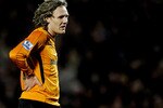 HULL, ENGLAND - MARCH 13: Jimmy Bullard of Hull City shows his dismay after Nicklas Bendtner of Arsenal scores the winner during the Barclays Premier League match between Hull City and Arsenal at KC Stadium on March 13, 2010 in Hull, England.  (Photo by Laurence Griffiths/Getty Images)