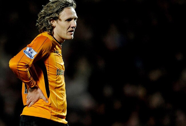 HULL, ENGLAND - MARCH 13: Jimmy Bullard of Hull City shows his dismay after Nicklas Bendtner of Arsenal scores the winner during the Barclays Premier League match between Hull City and Arsenal at KC Stadium on March 13, 2010 in Hull, England.  (Photo by Laurence Griffiths/Getty Images)