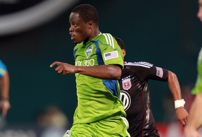 WASHINGTON - JULY 15: Steve Zakuani #11 of Seattle Sounders FC controls the ball against  Andy Najar #14 of D.C. United at RFK Stadium on July 15, 2010 in Washington, DC. (Photo by Ned Dishman/Getty Images)