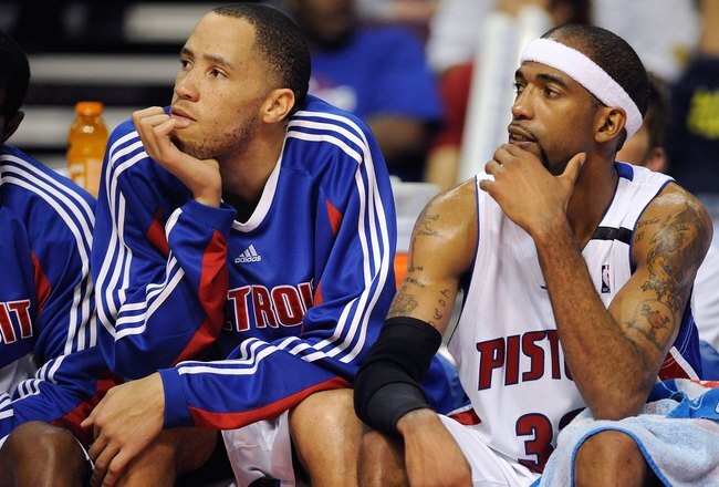 AUBURN HILLS, MI - APRIL 26:  (L-R) Tayshaun Prince #22 and Richard Hamilton #32 of the Detroit Pistons sit on the bench in Game Four of the Eastern Conference Quarterfinals against the Cleveland Cavaliers during the 2009 NBA Playoffs at the Palace of Auburn Hills on April 26, 2009 in Auburn Hills, Michigan.  The Cavaliers won 99-78.  NOTE TO USER: User expressly acknowledges and agrees that, by downloading and or using this photograph, User is consenting to the terms and conditions of the Getty Images License Agreement.  (Photo by Gregory Shamus/Getty Images)