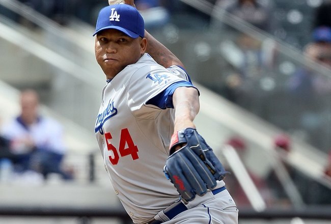 NEW YORK - APRIL 28:  Ronald Belisario #54 of the Los Angeles Dodgers pitches against the New York Mets on April 28, 2010 at Citi Field in the Flushing neighborhood of the Queens borough of New York City.  (Photo by Jim McIsaac/Getty Images)