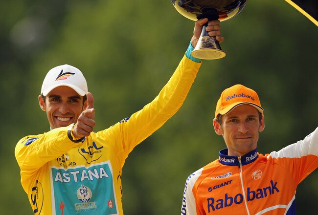 PARIS - JULY 25:  Alberto Contador of team Astana (L) celebrates as Denis Menchov of team Rabobank looks on after the twentieth and final stage of Le Tour de France 2010, from Longjumeau to the Champs-Elysees in Paris on July 25, 2010 in Paris, France.  (Photo by Spencer Platt/Getty Images)