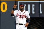 ATLANTA - JULY 15:  Jason Heyward #22 of the Atlanta Braves acknowledges the crowd after catching a deep fly ball and running into the wall in the fourth inning against the Milwaukee Brewers at Turner Field on July 15, 2010 in Atlanta, Georgia.  (Photo by Kevin C. Cox/Getty Images)