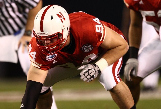 SAN DIEGO - DECEMBER 30:  Jared Crick #94 of the University of Nebraska Cornhuskers lines up in position during the Pacific Life Holiday Bowl against University of Arizona Wildcats on December 30, 2009 at Qualcomm Stadium in San Diego, California. The Cornhuskers defeated the Wildcats 33-0. (Photo By Donald Miralle/Getty Images)