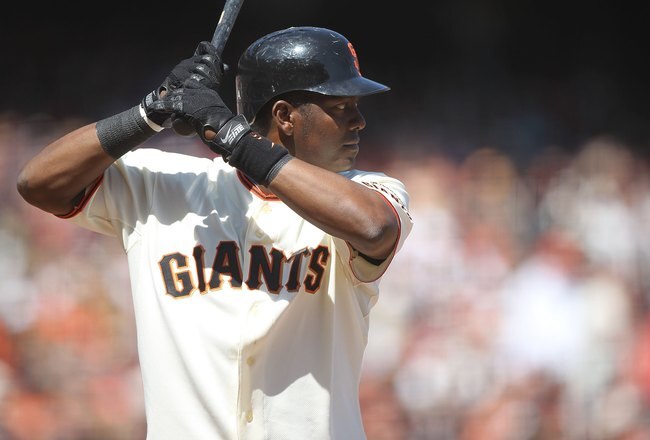 SAN FRANCISCO - APRIL 09:  Edgar Renteria #16 of the San Francisco Giants bats against the Atlanta Braves on Opening Day at AT&T Park on April 9, 2010 in San Francisco, California.  (Photo by Jed Jacobsohn/Getty Images)