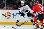 NEWARK, NJ - JANUARY 31:  Alexander Frolov #24 of the Los Angeles Kings skates against the New Jersey Devils at the Prudential Center on January 31, 2010 in Newark, New Jersey. The Kings defeated the Devils 3-2.  (Photo by Jim McIsaac/Getty Images)