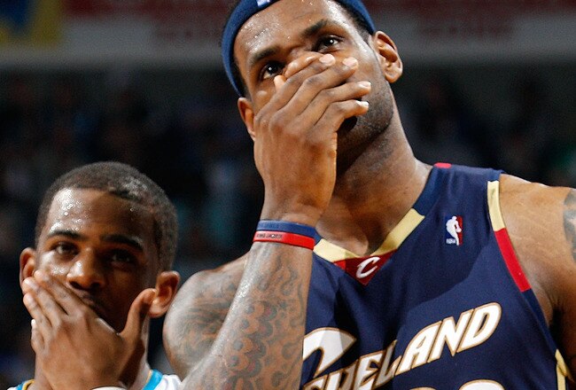 NEW ORLEANS - MARCH 24:  LeBron James #23 of the Cleveland Cavaliers talks with Chris Paul #3 of the New Orleans Hornets at the New Orleans Arena on March 24, 2010 in New Orleans, Louisiana.  The Cavaliers defeated the Hornets 105-92.  NOTE TO USER: User expressly acknowledges and agrees that, by downloading and/or using this Photograph, User is consenting to the terms and conditions of the Getty Images License Agreement.  v  (Photo by Chris Graythen/Getty Images)
