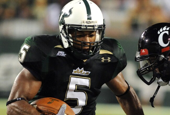 TAMPA, FL - OCTOBER 15:  Safety Nate Allen #5 of the University of South Florida Bulls intercepts a pass against the Cincinnati Bearcats October 15, 2009 at Raymond James Stadium in Tampa, Florida.  (Photo by Al Messerschmidt/Getty Images)