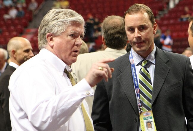 MONTREAL, QC - JUNE 26:  President & General Manager Brian Burke (L) of the Toronto Maple Leafs talks with Genral Manager Joe Nieuwendyk of the Dallas Stars prior to the first round of the 2009 NHL Entry Draft at the Bell Centre on June 26, 2009 in Montreal, Quebec, Canada.  (Photo by Bruce Bennett/Getty Images)