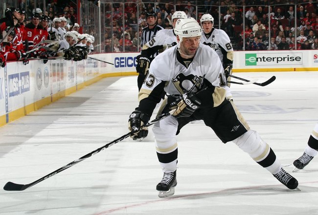 NEWARK, NJ - DECEMBER 30:  Bill Guerin #13 of the Pittsburgh Penguins skates during the game against the New Jersey Devils at the Prudential Center on December 30, 2009 in Newark, New Jersey.  (Photo by Bruce Bennett/Getty Images)