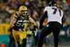 GREEN BAY, WI - DECEMBER 07: Clay Matthews #52 of the Green Bay Packers rushes against Jared Gaither #71 of the Baltimore Ravens at Lambeau Field on December 7, 2009 in Green Bay, Wisconsin. The Packers defeated the Ravens 27-17. (Photo by Jonathan Daniel/Getty Images)